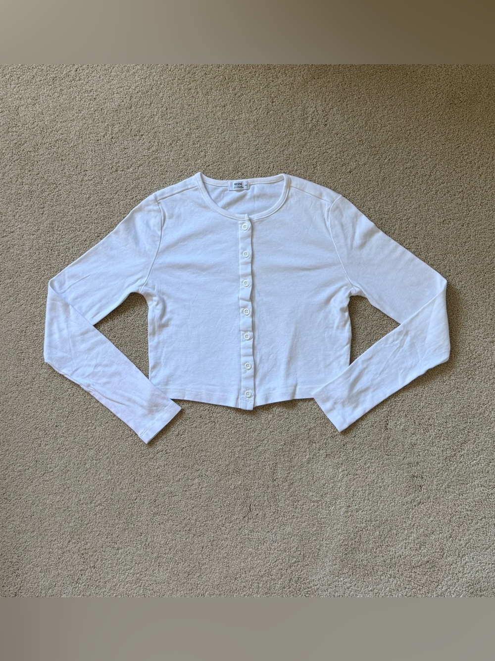 white long sleeve top